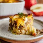 Craving a show stopping holiday brunch recipe? Our Apple Breakfast Casserole transforms your morning with layers of cinnamon-spiced apples and buttery goodness. Discover the ultimate holiday crowd pleaser!