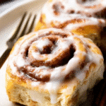 Craving bakery-style cinnamon rolls at home? Learn how to make easy cinnamon rolls with heavy whipping cream that are soft, fluffy, and absolutely irresistible. Discover your new favorite weekend baking recipe!